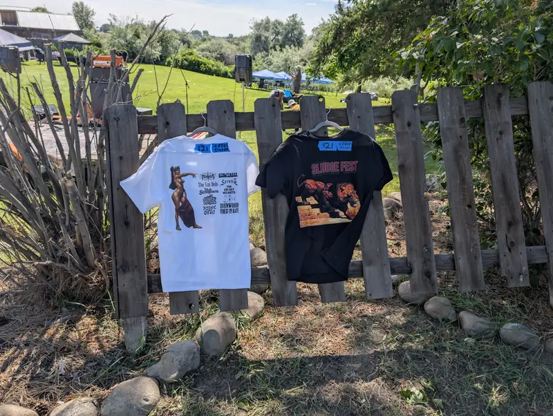 Sludge Fest shirts on the fence