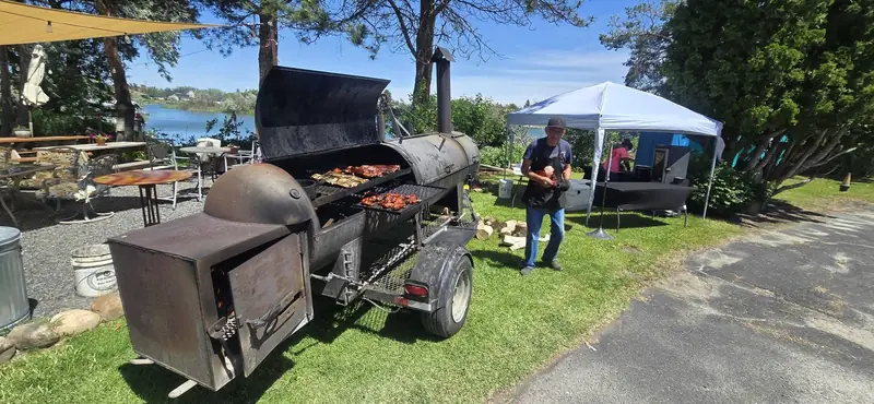 Porky's smoker trailer by the lake