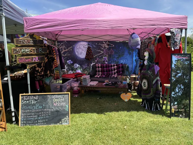 Twisted Seester's pink canopy craft booth